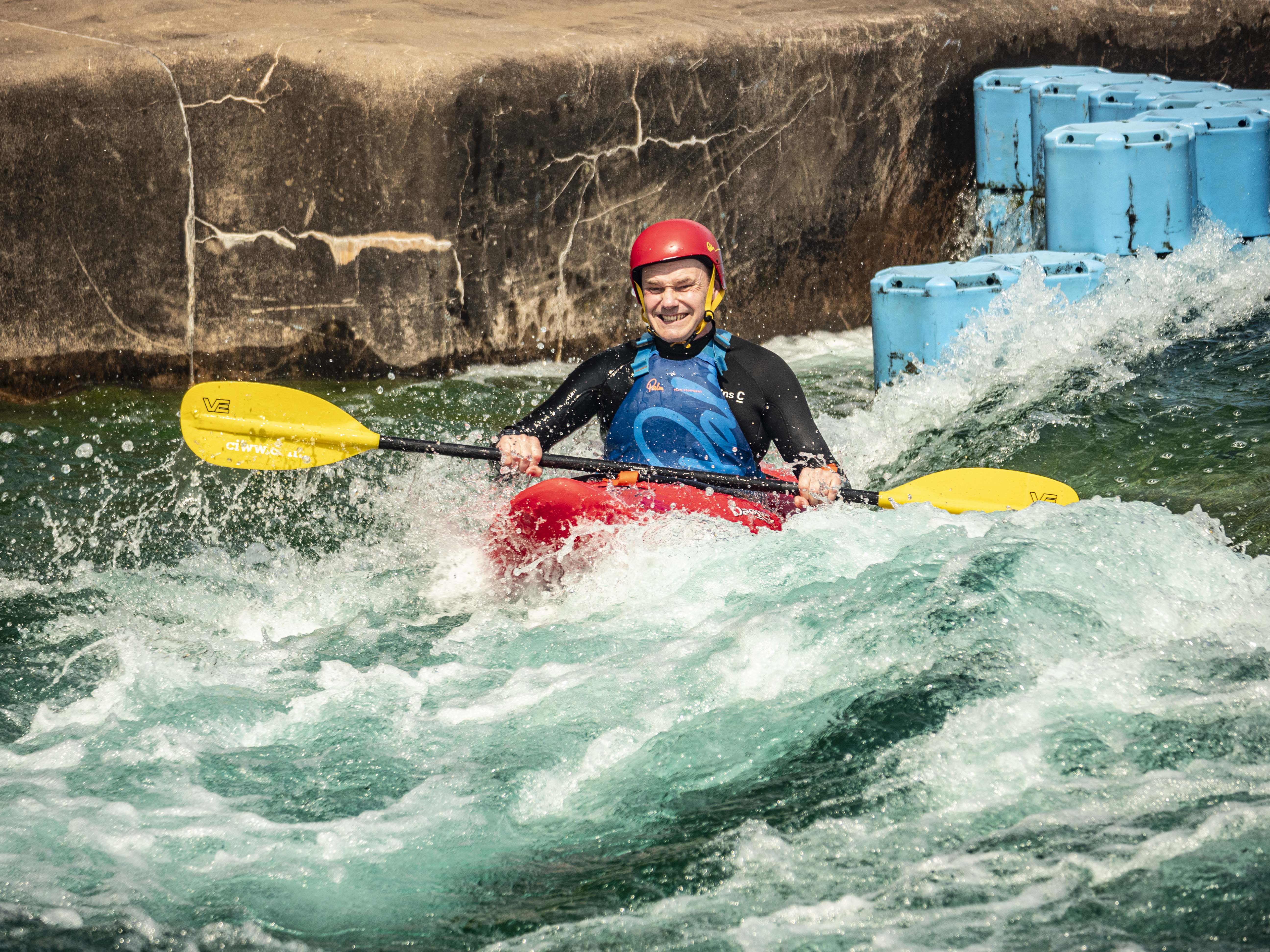 Smile like you mean it whilst you're kayaking